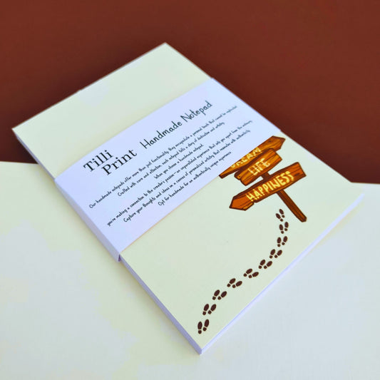 handcrafted notepads by tilli print, featuring "the right path" theme.