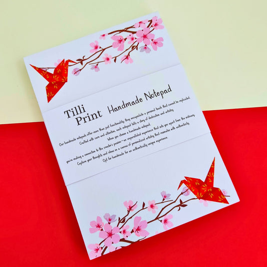 notepads with tilli print signature crane origami on sakura.